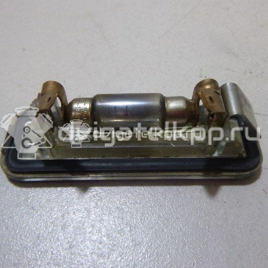Фото Фонарь подсветки номера  XS4X13550AB для Ford Focus