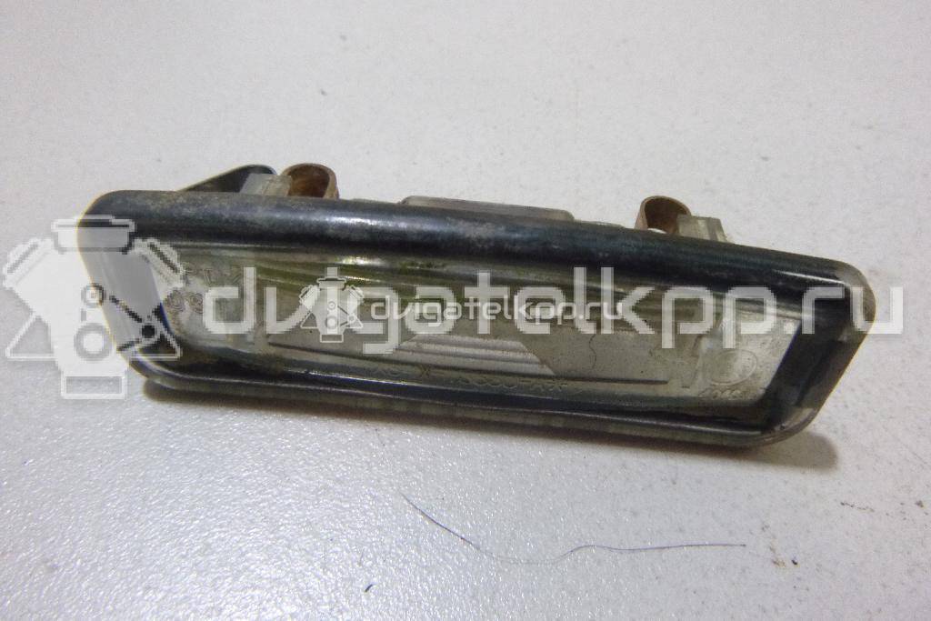 Фото Фонарь подсветки номера  XS4X13550AB для Ford Focus {forloop.counter}}