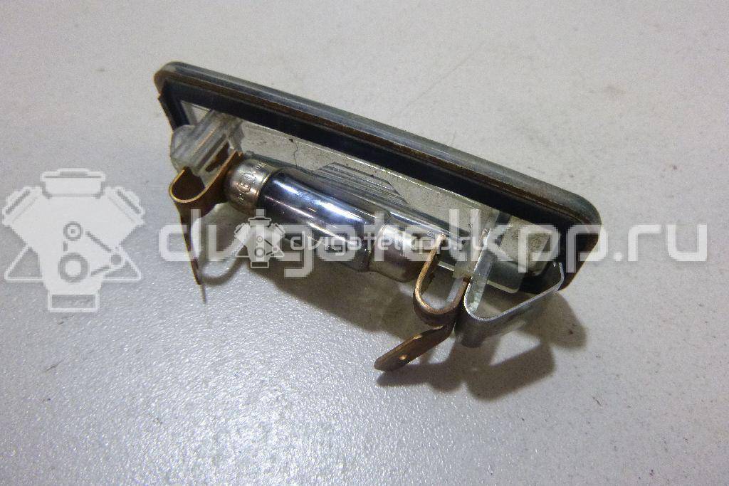 Фото Фонарь подсветки номера  XS4X13550AB для Ford Focus {forloop.counter}}