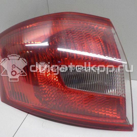 Фото Фонарь задний наружный левый  1710612 для Ford Kuga