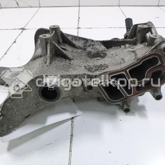 Фото Кронштейн генератора для двигателя CAWA для Volkswagen Jetta 170 л.с 16V 2.0 л бензин 06J903143AG