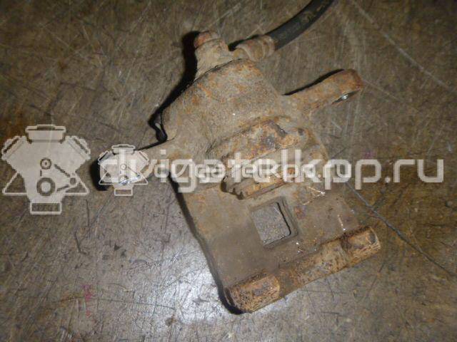 Фото Суппорт тормозной задний правый  583112HA00 для Hyundai Elantra {forloop.counter}}