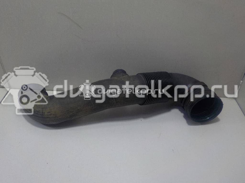 Фото Патрубок воздушного фильтра для двигателя AXC для Volkswagen Transporter / Multivan 85 л.с 8V 1.9 л Дизельное топливо 7H0129615E {forloop.counter}}