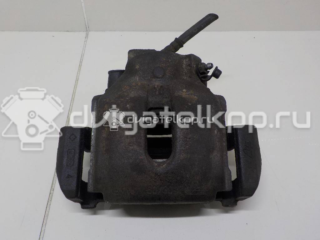 Фото Суппорт тормозной передний левый  SEB000290 для Land Rover Freelander / Range Rover {forloop.counter}}