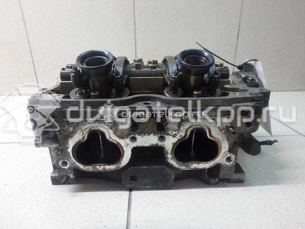 Фото Головка блока для двигателя EJ20 для Subaru Impreza 112-177 л.с 16V 2.0 л бензин 11039AB430 {forloop.counter}}