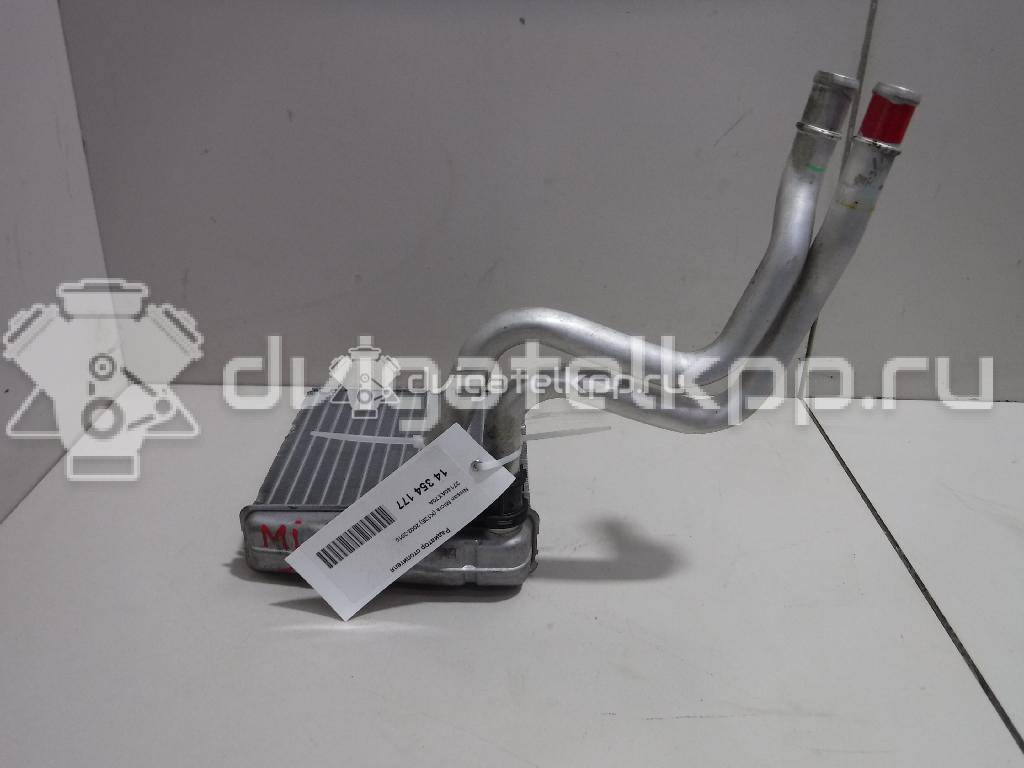 Фото Радиатор отопителя  27140AX70A для Nissan Note / Nv200 / Micra {forloop.counter}}