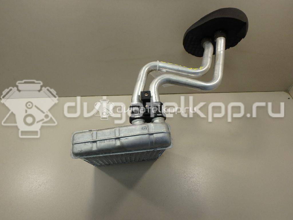 Фото Радиатор отопителя  27140AX70A для Nissan Note / Nv200 / Micra {forloop.counter}}