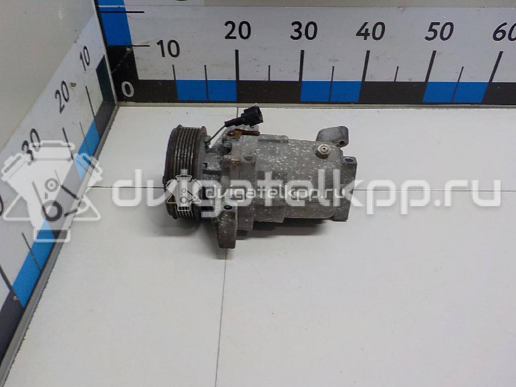 Фото Компрессор системы кондиционирования  92600CJ70A для Nissan Note / Tiida / Micra {forloop.counter}}
