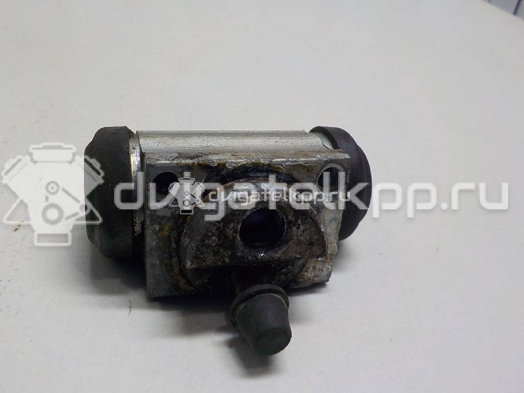 Фото Цилиндр тормозной задний  44100AX600 для Nissan Note / Tiida / Micra {forloop.counter}}