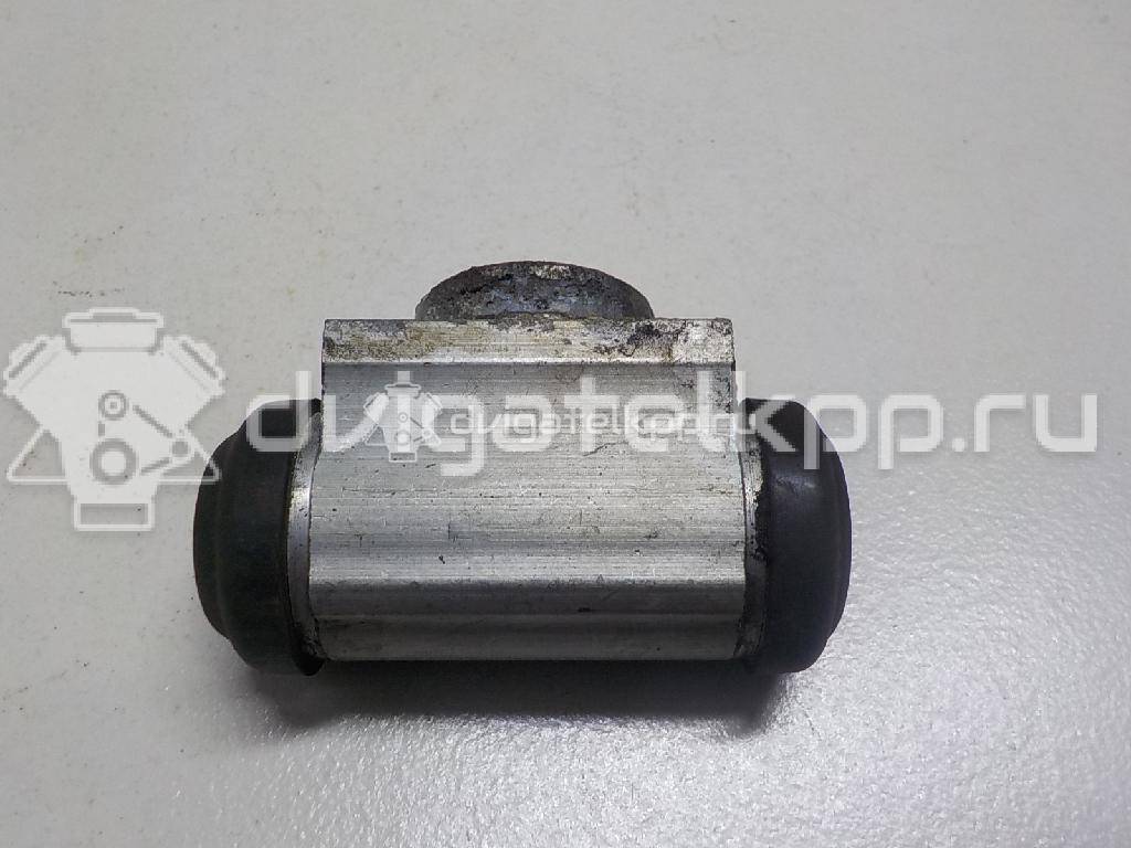 Фото Цилиндр тормозной задний  44100AX600 для Nissan Note / Tiida / Micra {forloop.counter}}