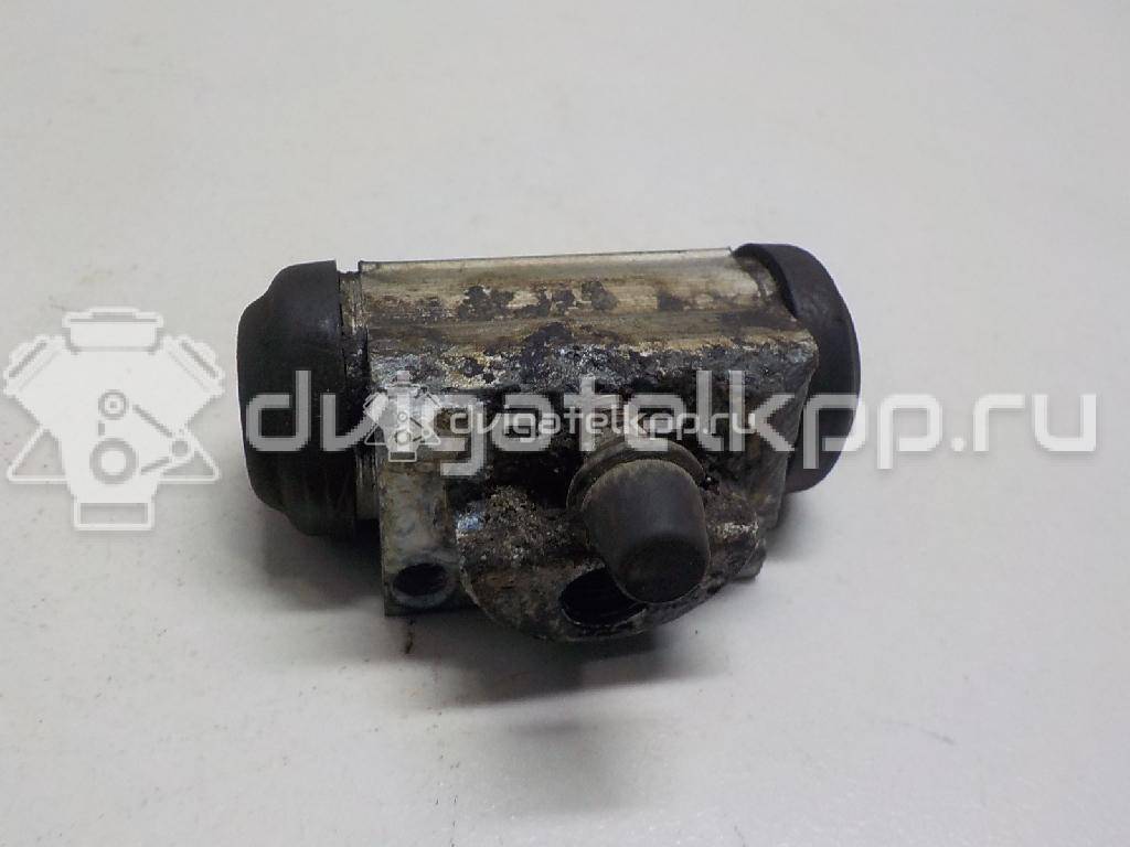 Фото Цилиндр тормозной задний  44100AX600 для Nissan Note / Tiida / Micra {forloop.counter}}