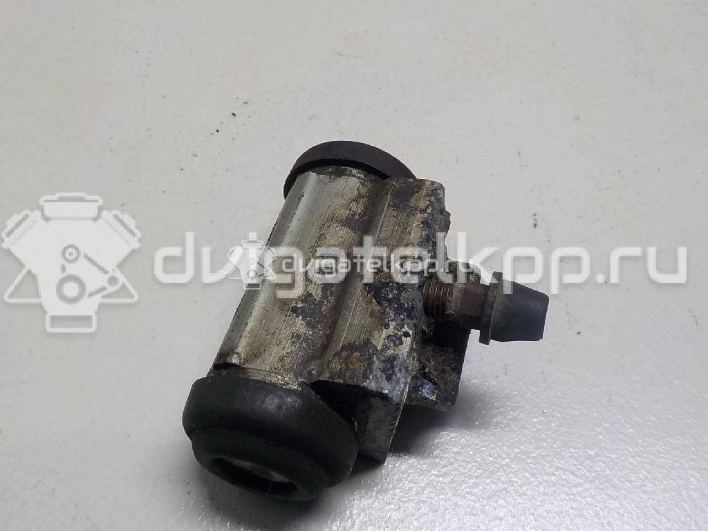 Фото Цилиндр тормозной задний  44100AX600 для Nissan Note / Tiida / Micra {forloop.counter}}