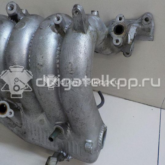 Фото Коллектор впускной для двигателя J20A для Maruti Suzuki / Suzuki / Chevrolet / Geo / Maruti 120-129 л.с 16V 2.0 л бензин 1311065D20