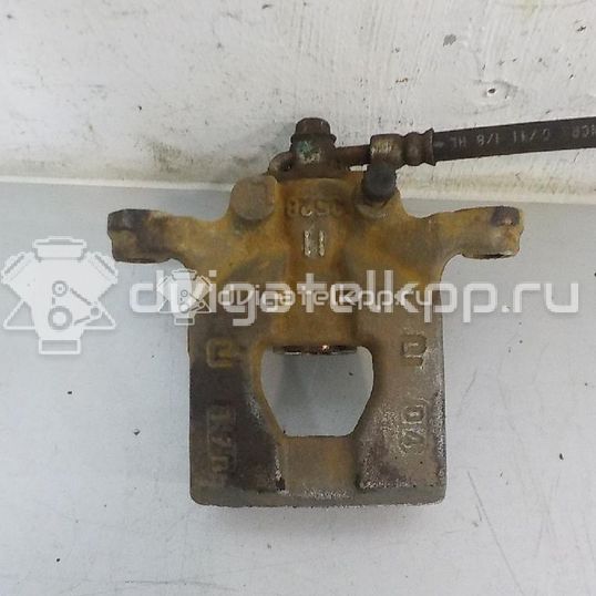Фото Суппорт тормозной задний правый  440011KD0A для Nissan Tiida / Qashqai / Cube Z12 / Juke F15 / Pulsar C13