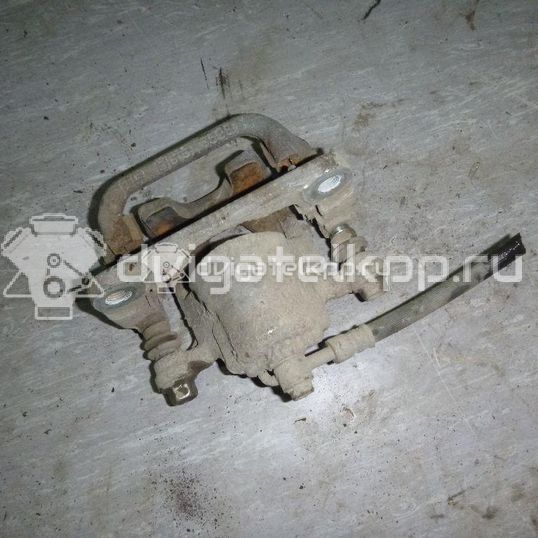 Фото Суппорт тормозной задний правый  440011KD0A для Nissan Tiida / Qashqai / Cube Z12 / Juke F15 / Pulsar C13