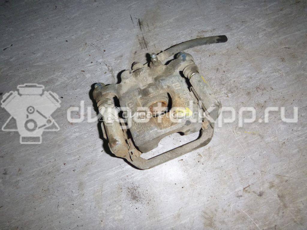 Фото Суппорт тормозной задний правый  440011KD0A для Nissan Tiida / Qashqai / Cube Z12 / Juke F15 / Pulsar C13 {forloop.counter}}