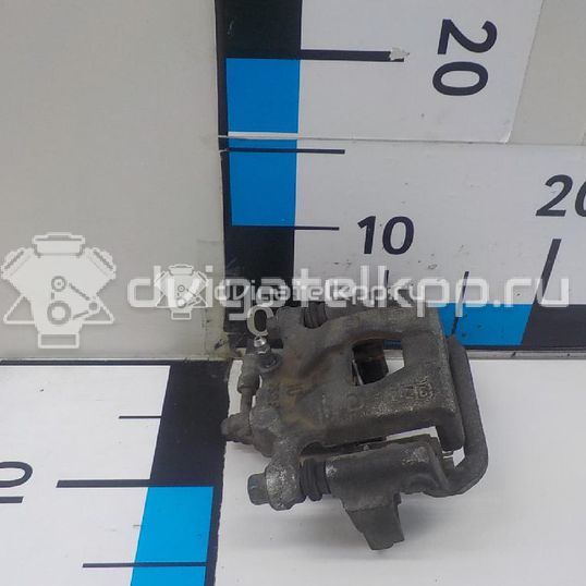Фото Суппорт тормозной задний правый  440011KD0A для Nissan Tiida / Qashqai / Cube Z12 / Juke F15 / Pulsar C13