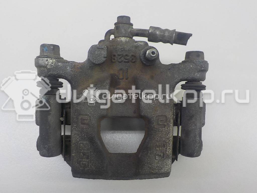 Фото Суппорт тормозной задний правый  440011KD0A для Nissan Tiida / Qashqai / Cube Z12 / Juke F15 / Pulsar C13 {forloop.counter}}