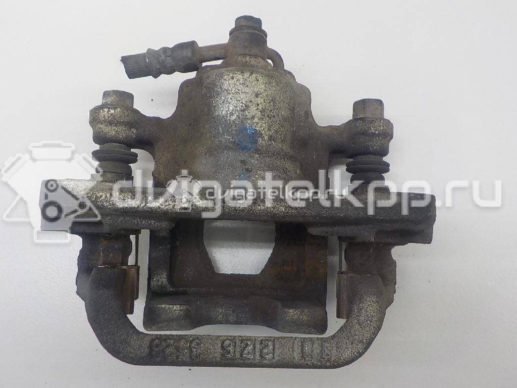 Фото Суппорт тормозной задний правый  440011KD0A для Nissan Tiida / Qashqai / Cube Z12 / Juke F15 / Pulsar C13 {forloop.counter}}