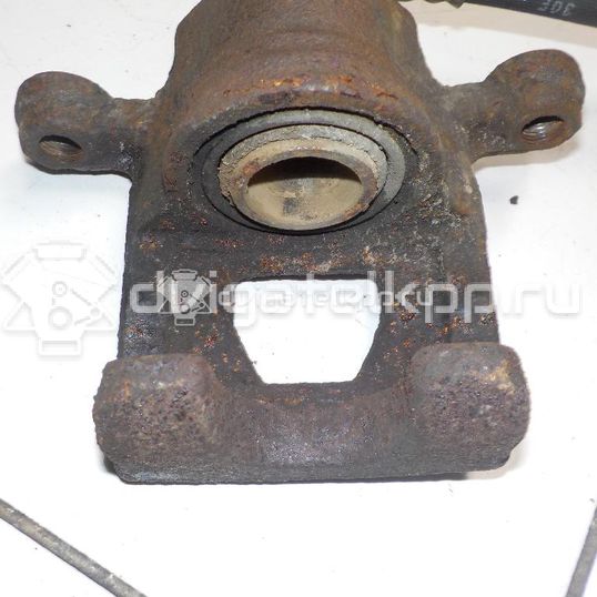 Фото Суппорт тормозной задний левый  440111KD0A для Nissan Tiida / Qashqai / Cube Z12 / Juke F15 / Pulsar C13