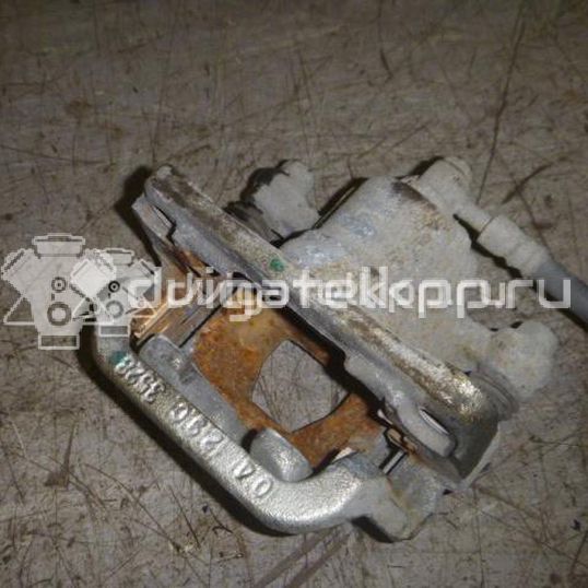 Фото Суппорт тормозной задний левый  440111KD0A для Nissan Tiida / Qashqai / Cube Z12 / Juke F15 / Pulsar C13