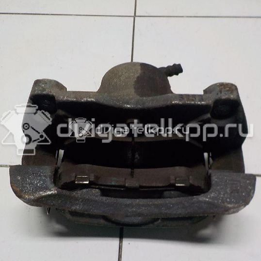 Фото Суппорт тормозной передний правый  410014EA0A для Nissan Qashqai