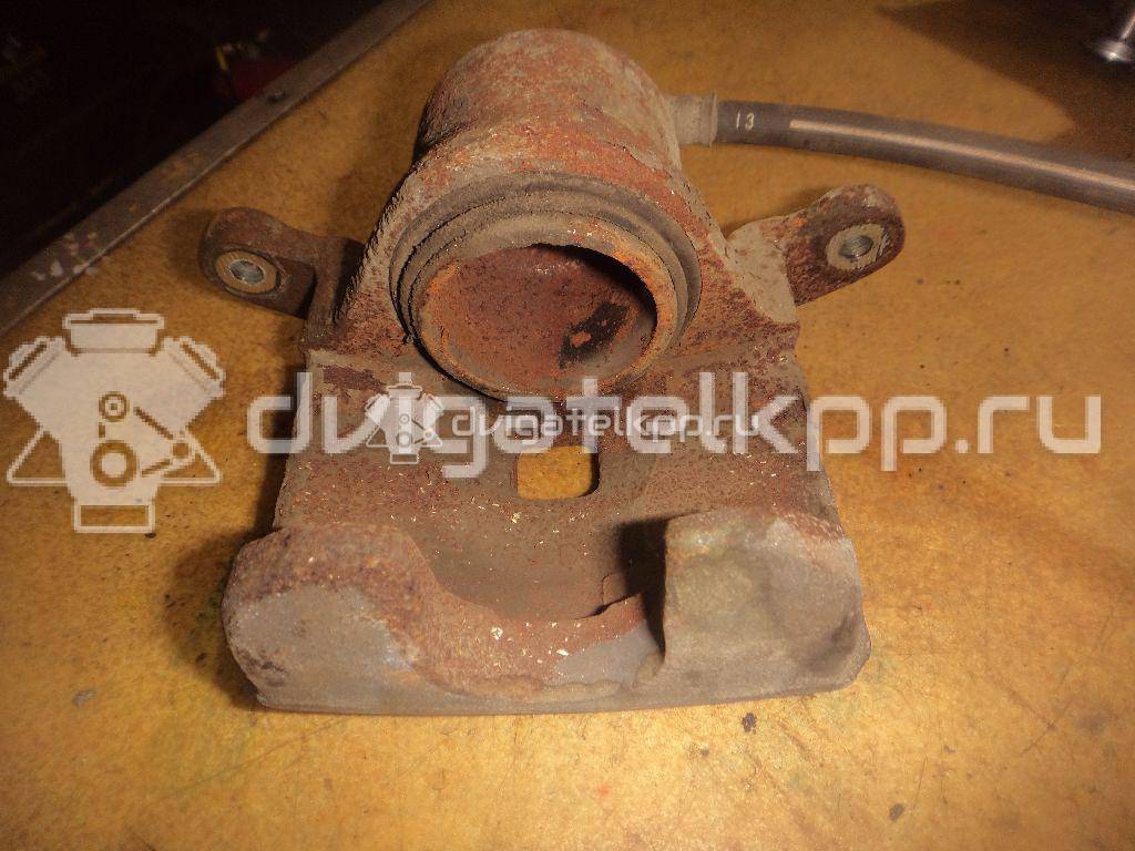 Фото Суппорт тормозной передний правый  41001JN00A для Nissan Juke F15 / Pulsar C13 {forloop.counter}}