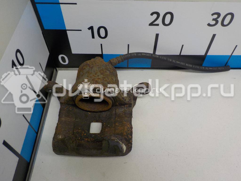 Фото Суппорт тормозной передний правый  41001ET00A для Nissan Juke F15 {forloop.counter}}