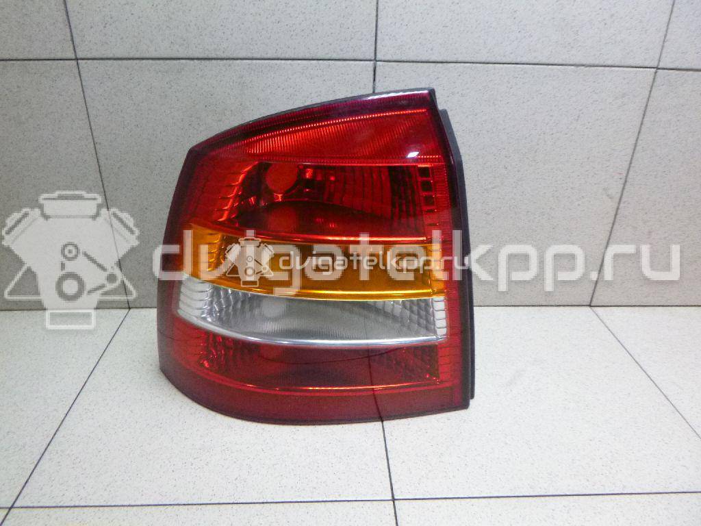 Фото Фонарь задний левый  9117402 для Opel Astra {forloop.counter}}