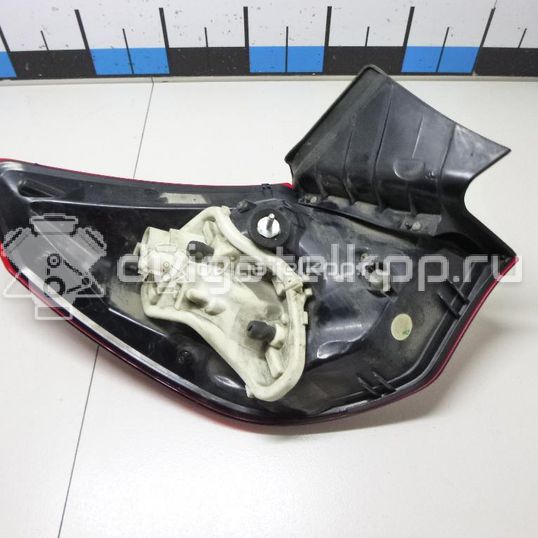 Фото Фонарь задний наружный правый  13319948 для Opel Astra
