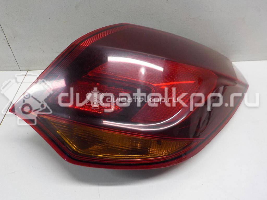 Фото Фонарь задний наружный правый  13319948 для Opel Astra {forloop.counter}}