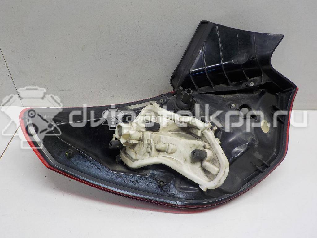 Фото Фонарь задний наружный правый  13319948 для Opel Astra {forloop.counter}}