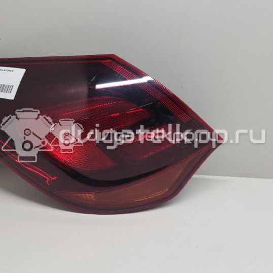 Фото Фонарь задний наружный левый  13319949 для Opel Astra