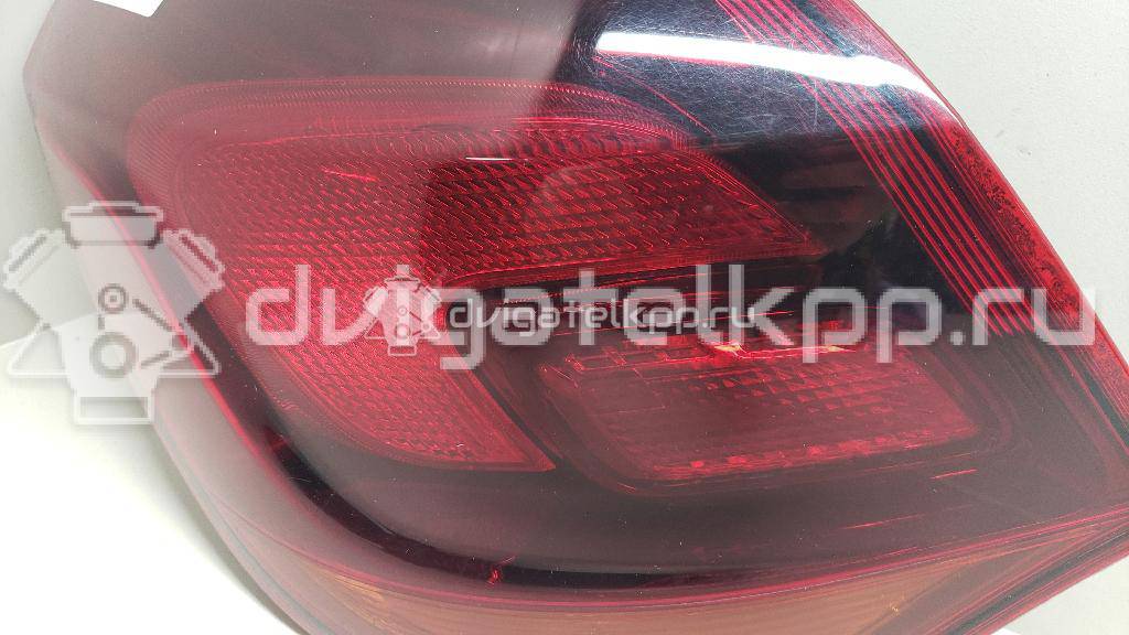 Фото Фонарь задний наружный левый  13319949 для Opel Astra {forloop.counter}}