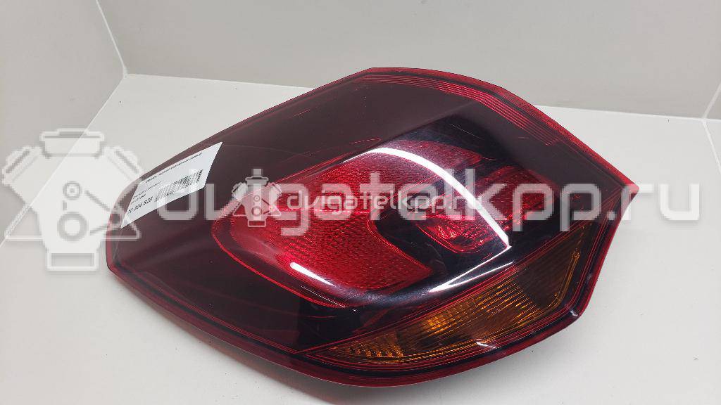 Фото Фонарь задний наружный левый  13319949 для Opel Astra {forloop.counter}}