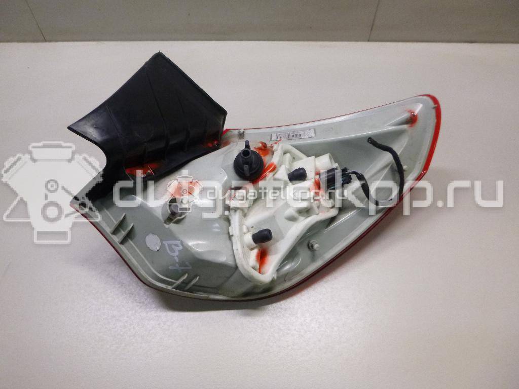 Фото Фонарь задний наружный левый  13306453 для Opel Astra {forloop.counter}}