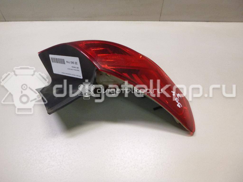 Фото Фонарь задний наружный левый  13306453 для Opel Astra {forloop.counter}}