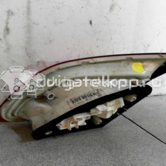 Фото Фонарь задний внутренний левый  1222108 для Opel Astra
