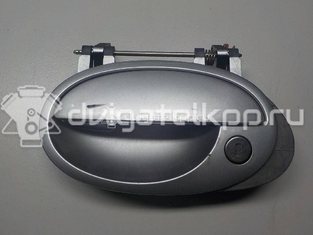 Фото Ручка двери передней наружная левая  9201122 для Opel Corsa / Combo / Meriva {forloop.counter}}