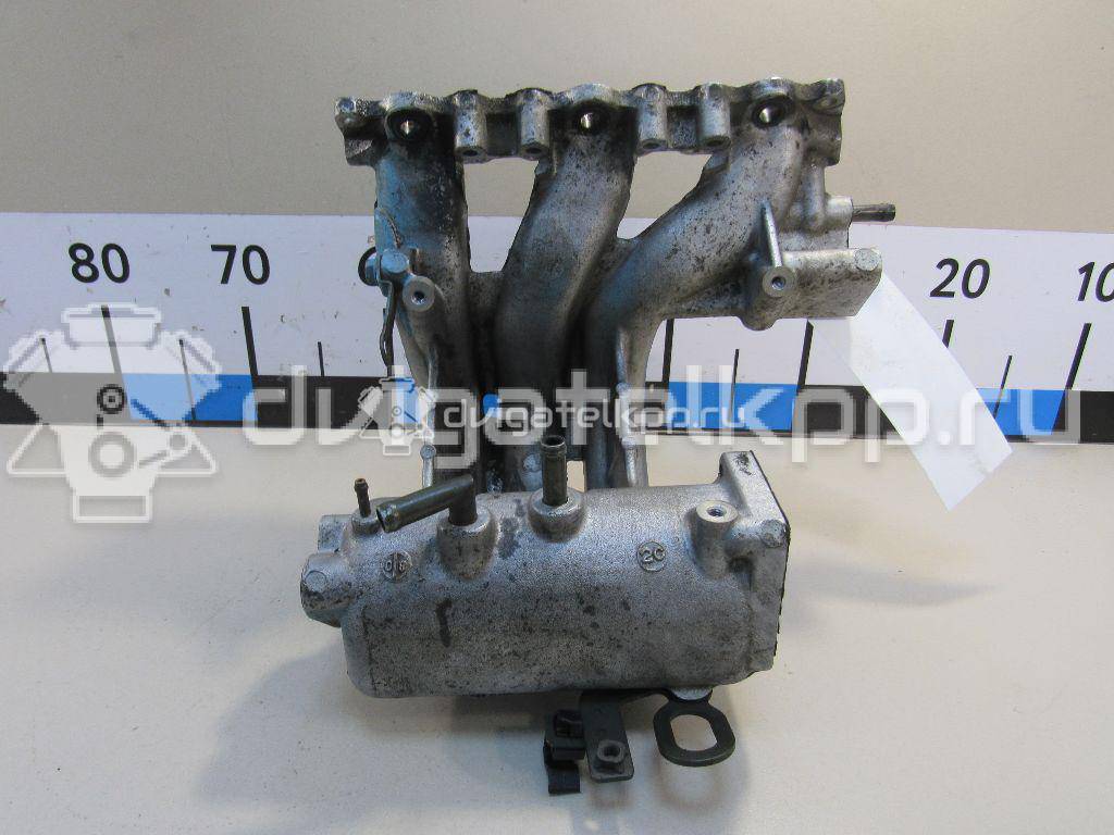 Фото Коллектор впускной для двигателя K6A для Suzuki / Mazda / Nissan 49-60 л.с 12V 0.7 л бензин 1311076JA1 {forloop.counter}}