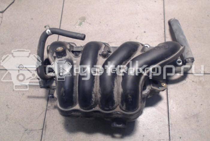 Фото Коллектор впускной для двигателя K12B для Suzuki / Mitsubishi / Vauxhall 86-94 л.с 16V 1.2 л бензин 1311069L00 {forloop.counter}}