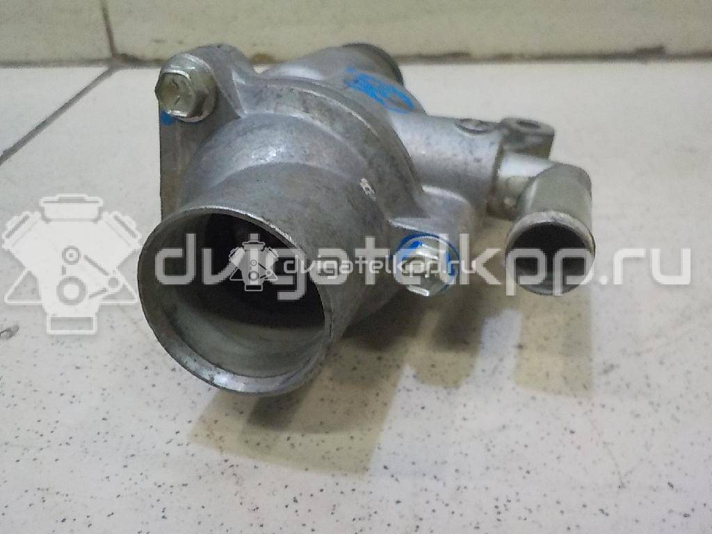 Фото Корпус термостата для двигателя M15A для Subaru / Suzuki / Chevrolet / Holden 99-109 л.с 16V 1.5 л бензин 1769080JA0 {forloop.counter}}