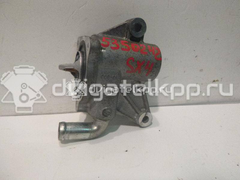 Фото Корпус термостата для двигателя M15A для Subaru / Suzuki / Chevrolet / Holden 99-109 л.с 16V 1.5 л бензин 1769080JA0 {forloop.counter}}