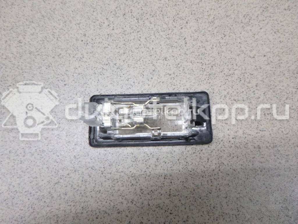 Фото Фонарь подсветки номера  5N0943021A для Seat Ibiza / Alhambra {forloop.counter}}