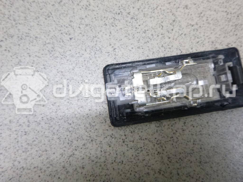 Фото Фонарь подсветки номера  5N0943021A для Seat Ibiza / Alhambra {forloop.counter}}