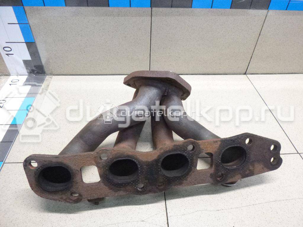 Фото Коллектор выпускной для двигателя J20A для Maruti Suzuki / Suzuki / Chevrolet / Geo / Maruti 120-129 л.с 16V 2.0 л бензин 1411080J01 {forloop.counter}}