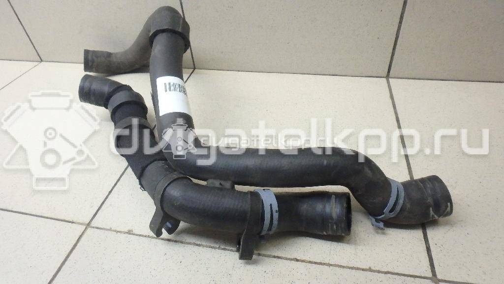 Фото Патрубок радиатора  6R0122101P для skoda Fabia {forloop.counter}}