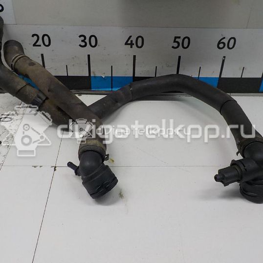 Фото Патрубок радиатора  5Q0121049AD для skoda Octavia (A7)