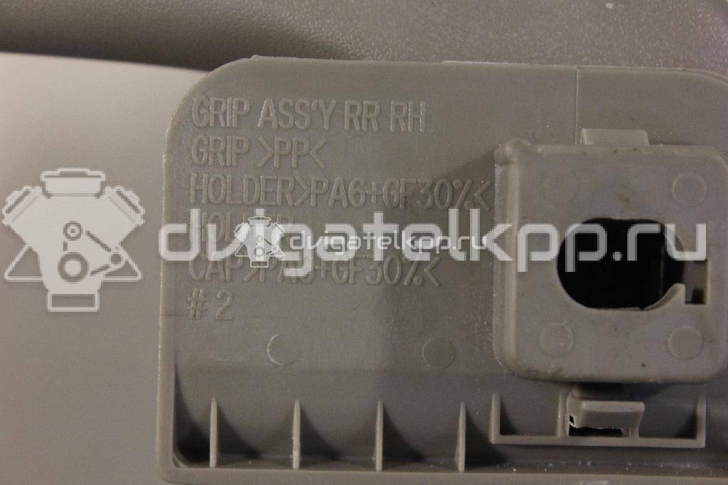 Фото Ручка внутренняя потолочная  7762034100EAW для ssang yong Actyon New/Korando C {forloop.counter}}