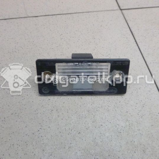 Фото Фонарь подсветки номера  1J5943021A для Volkswagen Tiguan / Bora / Touareg / Golf / Passat